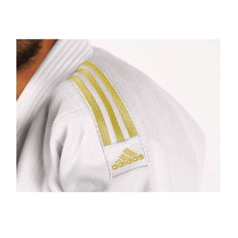 adidas jack bruin met gouden strepen